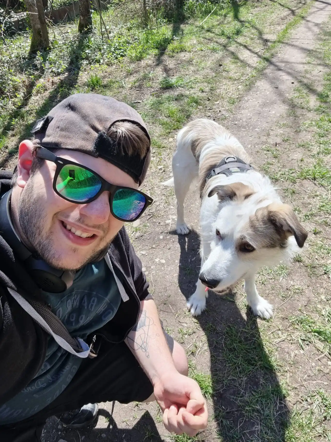 Riccardo, founder and developer of GuildNest, outdoors with his dog